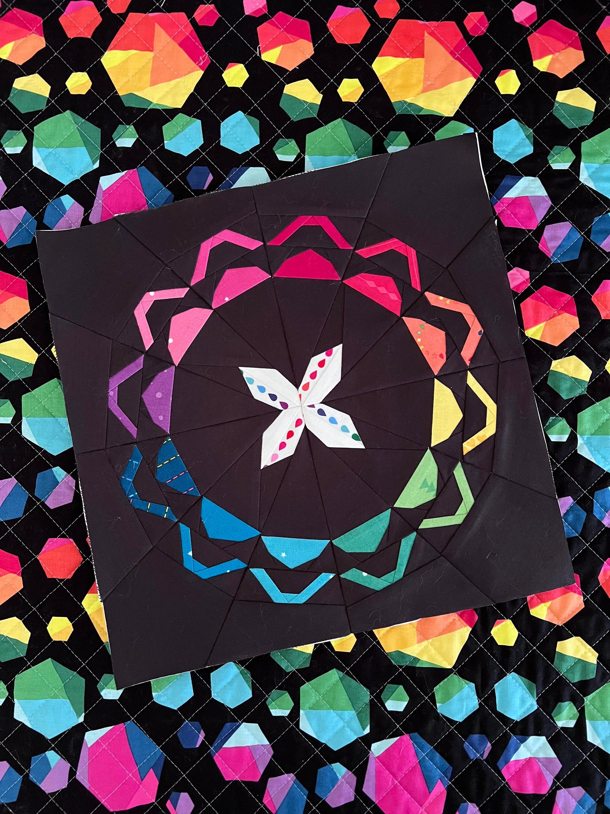 Ablaze paper pieced pattern sewn in fabric