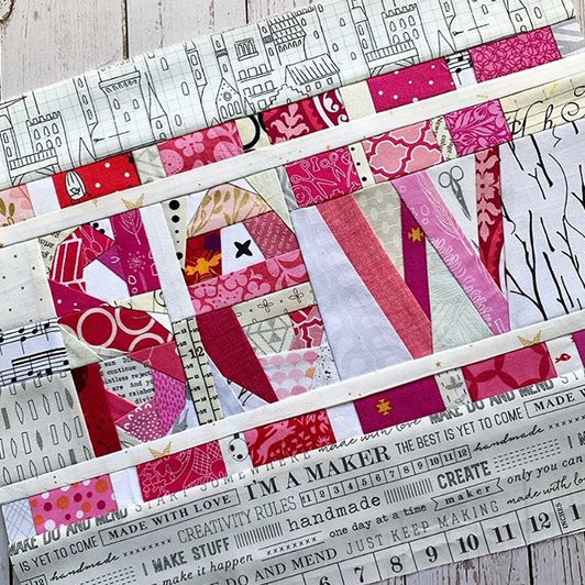 sew in text paper pieced pattern sewn in fabric
